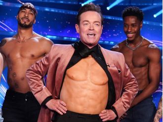 Fans stunned as Stephen Mulhern tears shirt open on Dancing On Ice, causing them to freak out.