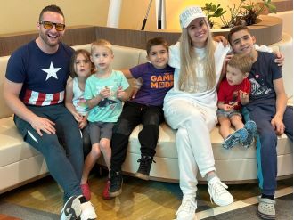 A polyamorous couple has openly dated 60 women and is transparent with their children.