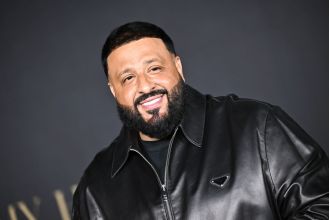 DJ Khaled embarrassed himself by forcing Black security guards to lift him on stage for a foolish reason.