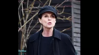 Former '80s star, now 57, appears with spouse after 34 years since popular song.