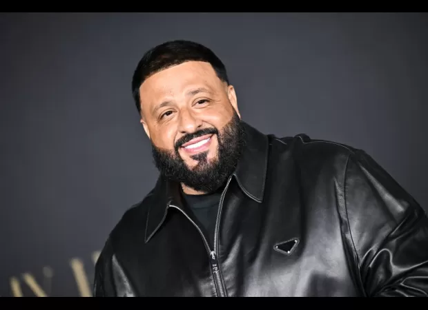 DJ Khaled embarrassed himself by forcing Black security guards to lift him on stage for a foolish reason.