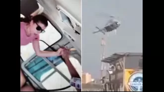 Tourist helicopter crashes into building after losing control.