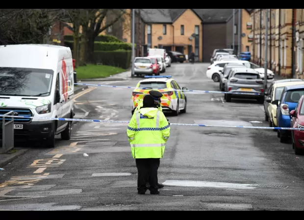 A 14-year-old boy is in critical condition after being stabbed while opening the door.