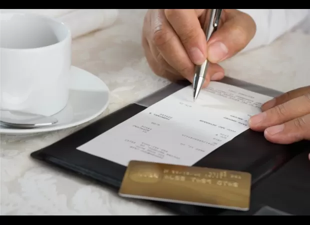 Atlanta eatery criticized for charging additional fees on customer's bill.