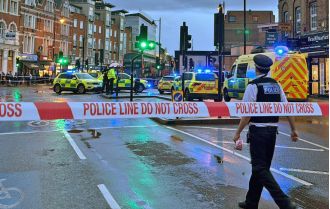 Assailants riding moped shoot three people in Clapham Common.
