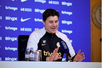 Soccer coach Pochettino criticizes his team's supporters for jeering a player from rival team Chelsea.