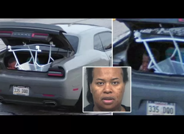 Mother caught driving with son holding down baby bassinet in open car trunk.