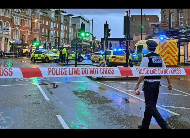 Assailants riding moped shoot three people in Clapham Common.