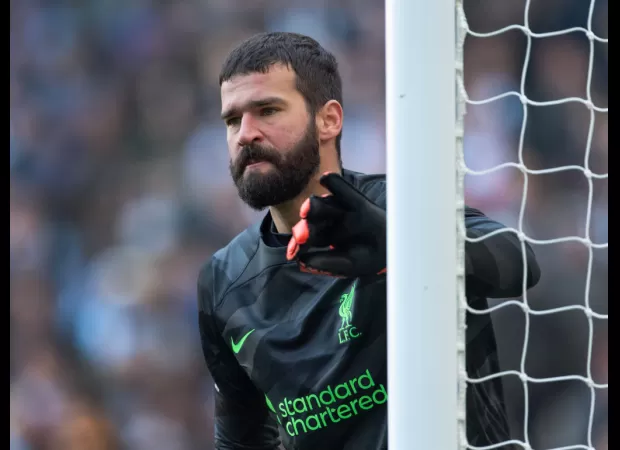 The manager of Liverpool FC, Jurgen Klopp, announces a severe injury to goalkeeper Alisson Becker, dealing a major setback.