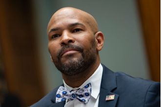A former surgeon general criticizes America's healthcare system, highlighting the issue of medical bankruptcy in the country.