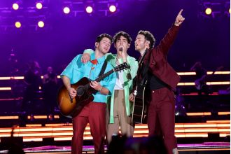 Noughties pop group fans angry as ticket prices reduced due to low sales.