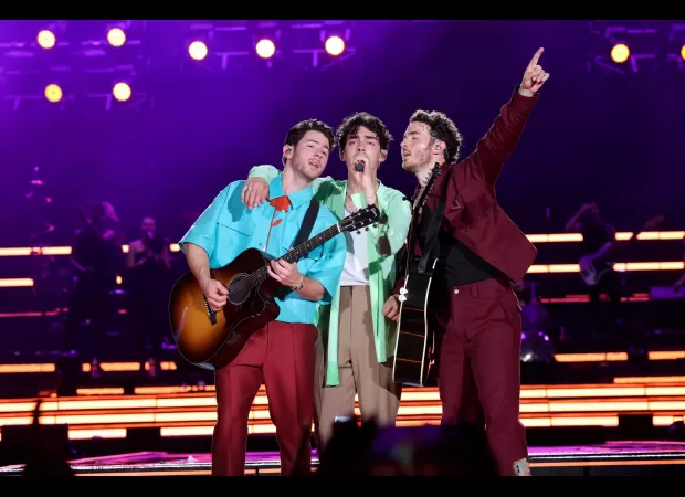 Noughties pop group fans angry as ticket prices reduced due to low sales.