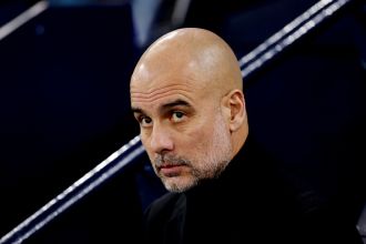 Guardiola cautions his Manchester City players before their match against Liverpool.
