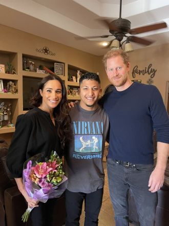 The Duke and Duchess of Sussex surprise a party by singing happy birthday.
