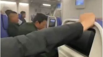 Video shows passengers terrified by strong turbulence on plane.