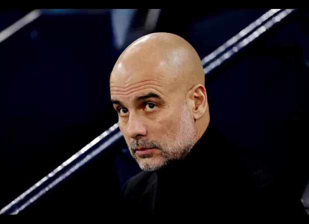 Guardiola cautions his Manchester City players before their match against Liverpool.