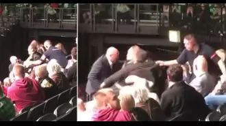 Security removed protesters from Crufts during best in show announcement.