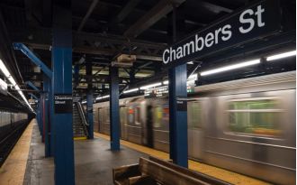 Man in New York arrested for pushing girlfriend onto subway tracks.