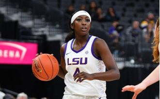 Flau'jae Johnson's brother was arrested for jumping onto a basketball court during a fight between LSU and South Carolina.