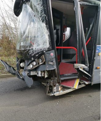 Impatient driver causes collision as double-decker bus hits BMW in bus lane.