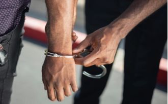 A man from New Jersey was taken into custody for confronting a teenager in a high school classroom.