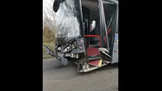 Impatient driver causes collision as double-decker bus hits BMW in bus lane.