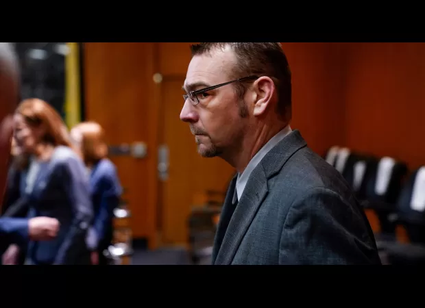 Father found guilty for purchasing gun used in fatal school shooting by son.