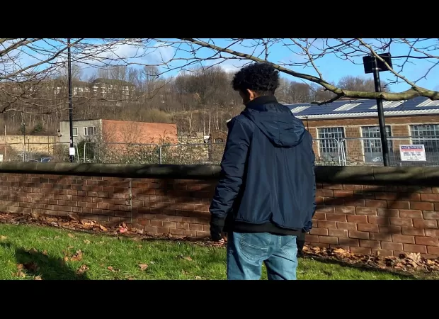 A young refugee claims to be a child, but the government believes they are 26 years old.