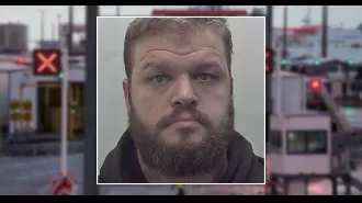 Customs agent caught on camera using hidden device to spy on women in bathroom while girlfriend assisted