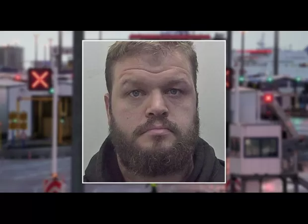 Customs agent caught on camera using hidden device to spy on women in bathroom while girlfriend assisted