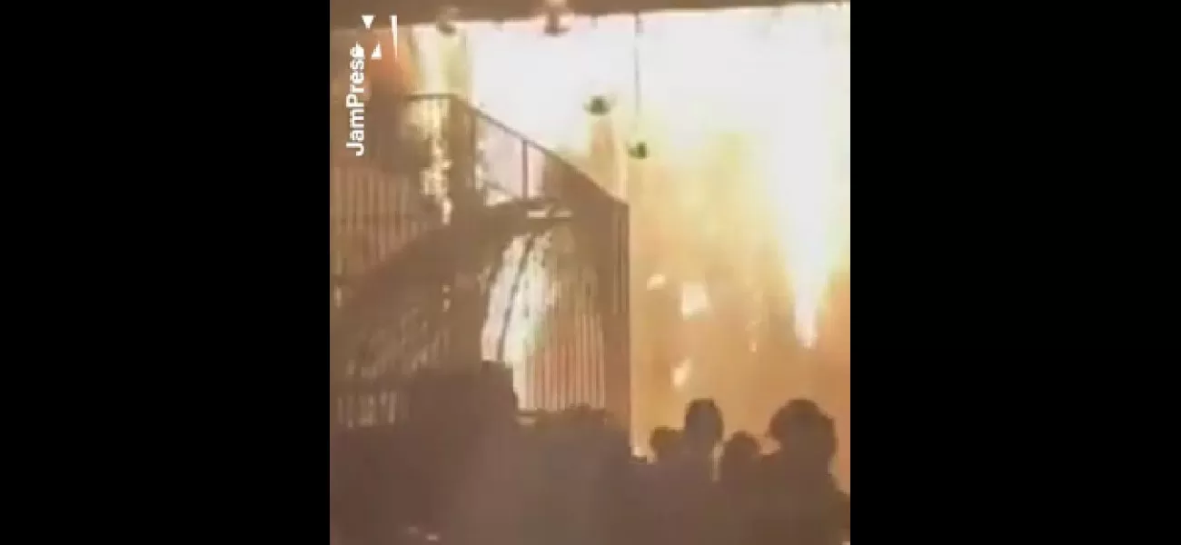 Massive blaze destroys wedding location when tent catches fire.