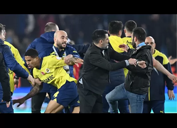 Soccer player Batshuayi tries kick on fan during violent Trabzonspor v Fenerbahce match.
