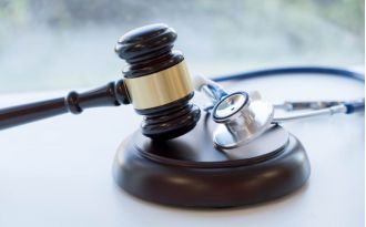 A doctor in Georgia must pay damages for sharing videos of a decapitated baby.