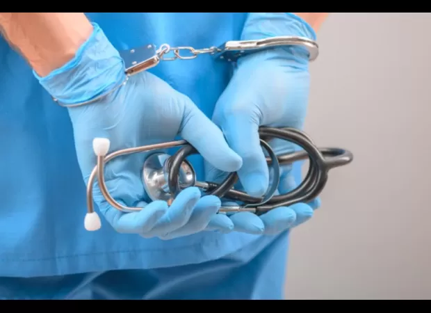 A man who is married and works as a nurse has been accused of attempting to terminate his girlfriend's pregnancy.