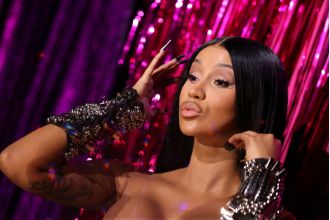 Cardi B reacts to rumors of her $80 million net worth, stating that she has earned a significant amount of money.