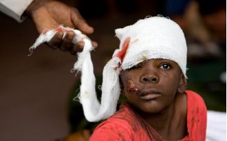 Haitian pastor protects kids during crisis despite gang violence.