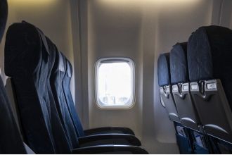 A flight attendant shares the one seat on an airplane that passengers should never reserve.