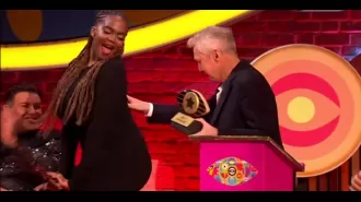 Louis Walsh is facing criticism for allegedly hitting Oti Mabuse's buttocks during a live TV show.
