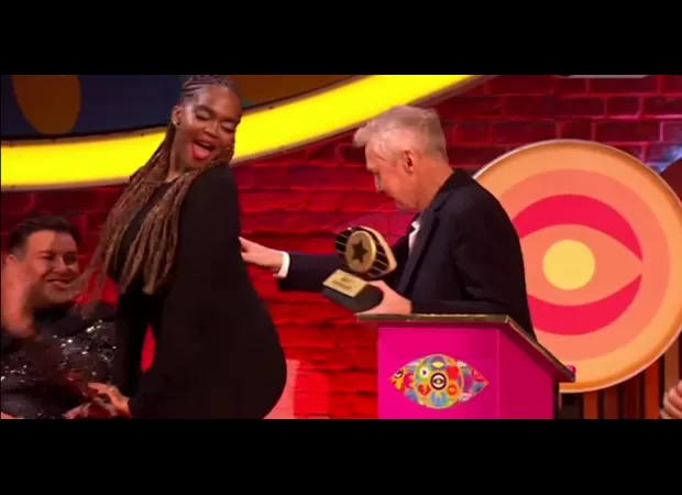 Louis Walsh is facing criticism for allegedly hitting Oti Mabuse's buttocks during a live TV show.