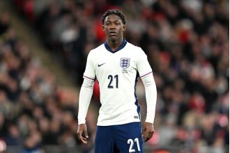 Portuguese soccer star Bruno Fernandes congratulates young Manchester United player Kobbie Mainoo on his debut with the England team.