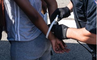 A mother in Baton Rouge was taken into custody when her child was discovered with a gunshot injury.