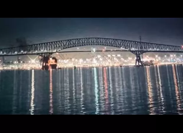 Massive bridge crumbles after vessel crashes into it, measuring 9,000 feet in length.