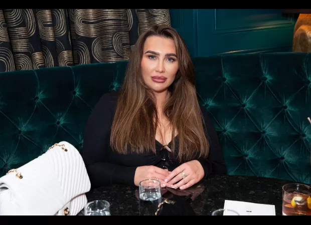 Reality TV star Lauren Goodger struggled with the loss of her daughter and didn't feel like being present.