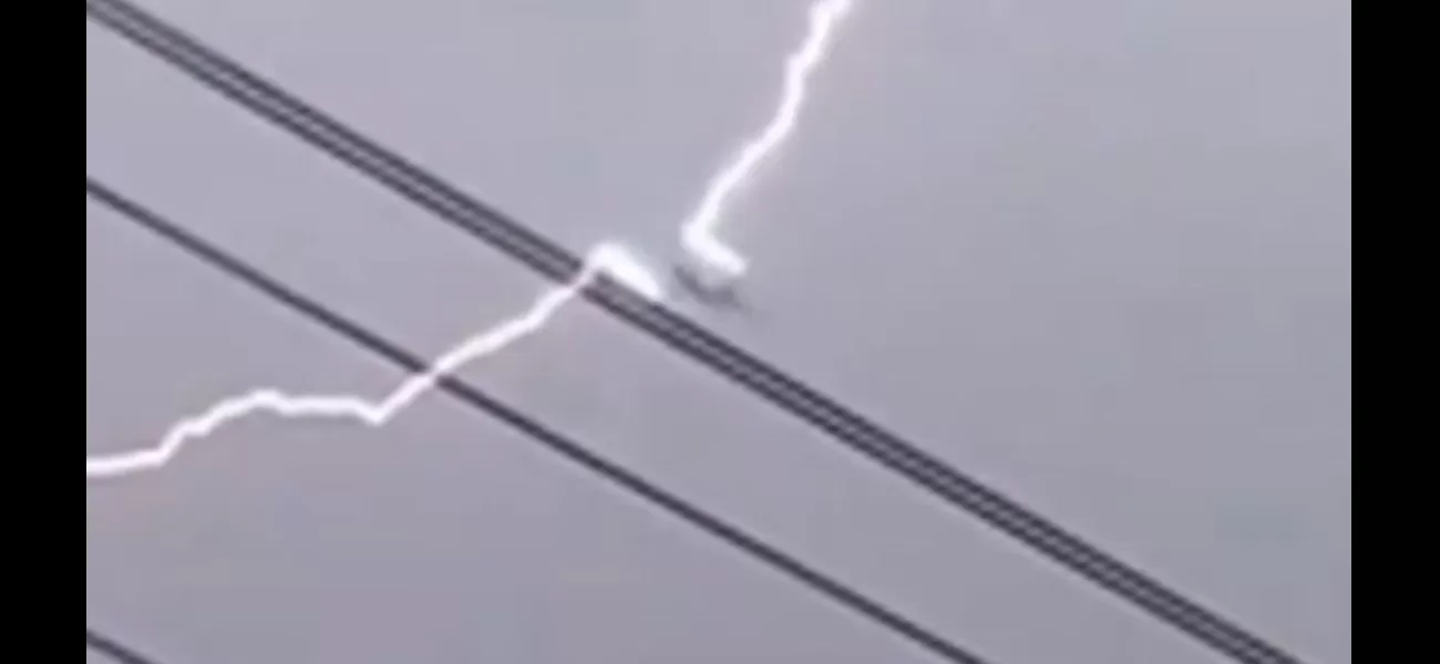 During a large storm, a plane appears to have been hit by lightning.