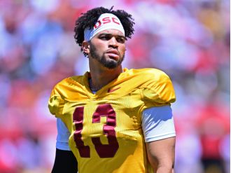 Caleb Williams' pink accessories cause a stir on social media with teasing comments.