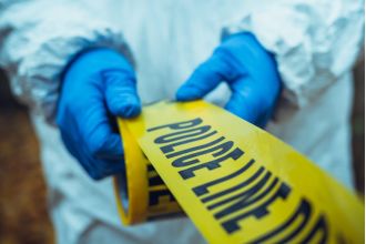 Two men accused of killing an educator at a restaurant in 2023 are facing charges.