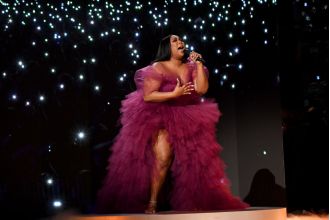 Lizzo considers giving up music due to online negativity.