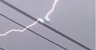 During a large storm, a plane appears to have been hit by lightning.