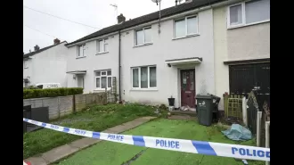 Police have arrested a man in connection with the murder of a 48-year-old woman in a house.