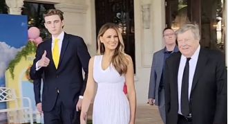 Melania Trump happily escorts her 18-year-old son Barron to Easter brunch.
